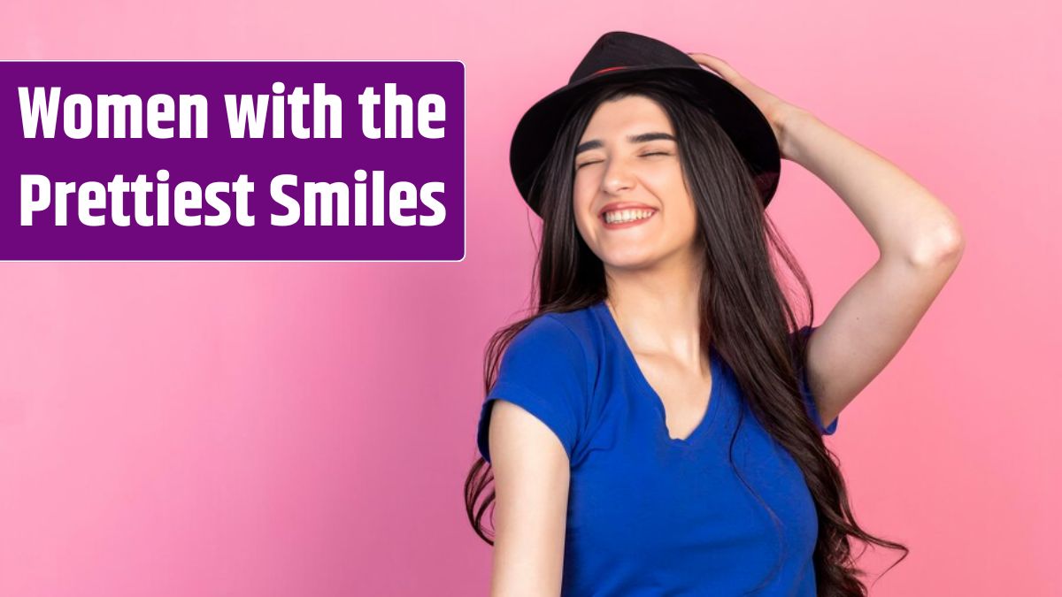 Cheerful young lady wearing hat and smiling.