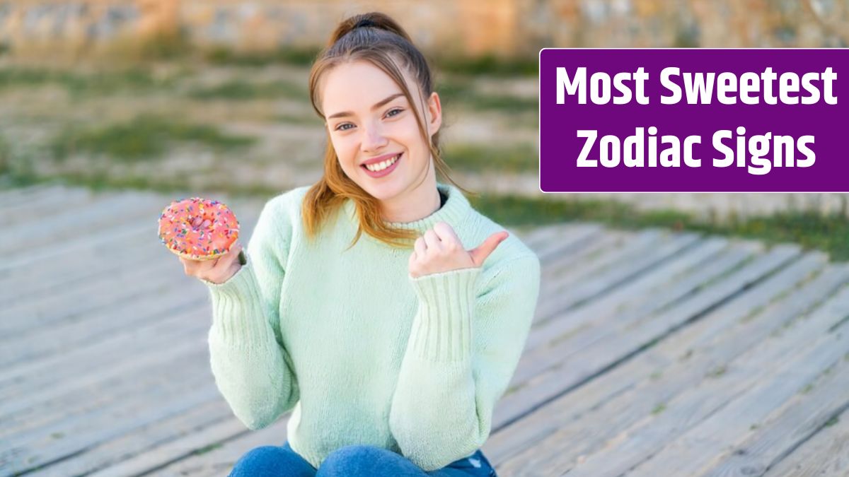 Young pretty girl holding a donut at outdoors pointing to the side to present a product.