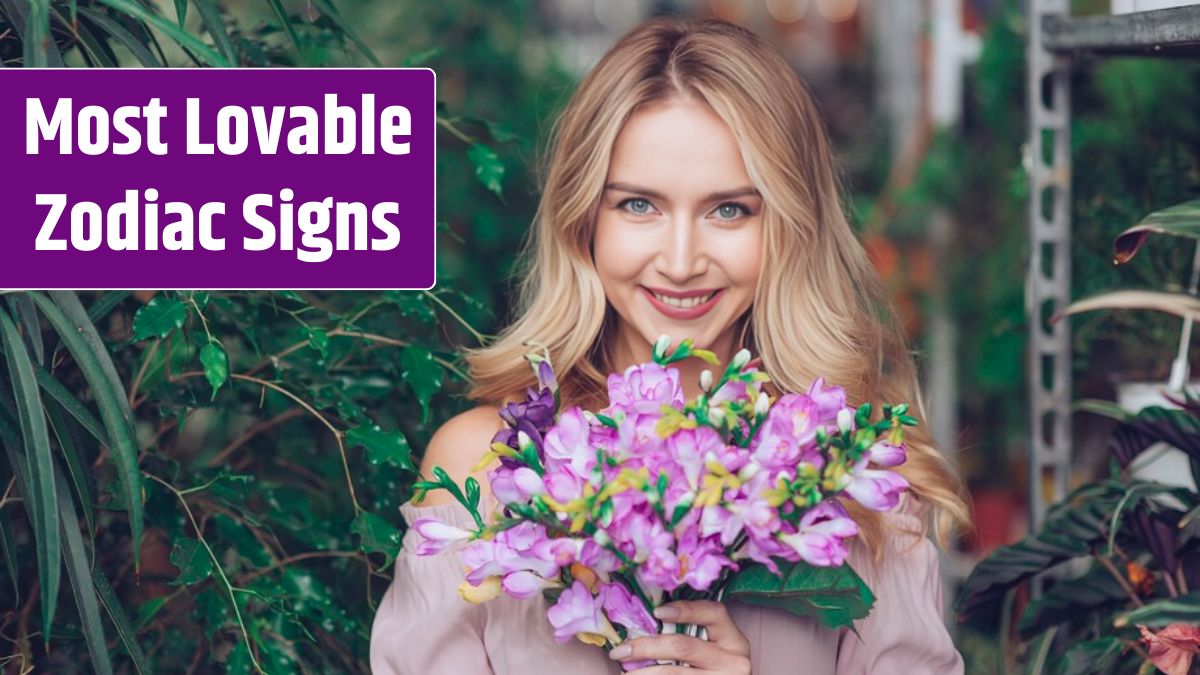 Blonde young woman holding purple flower bouquet in hands.