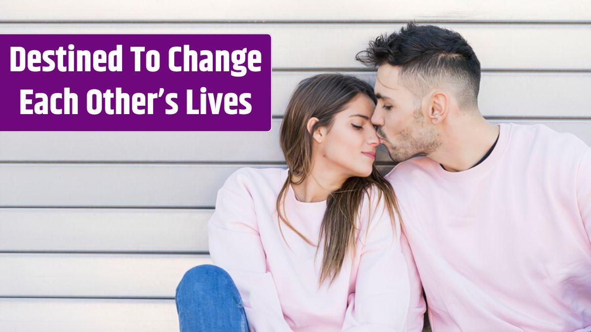 Handsome man kissing young woman.