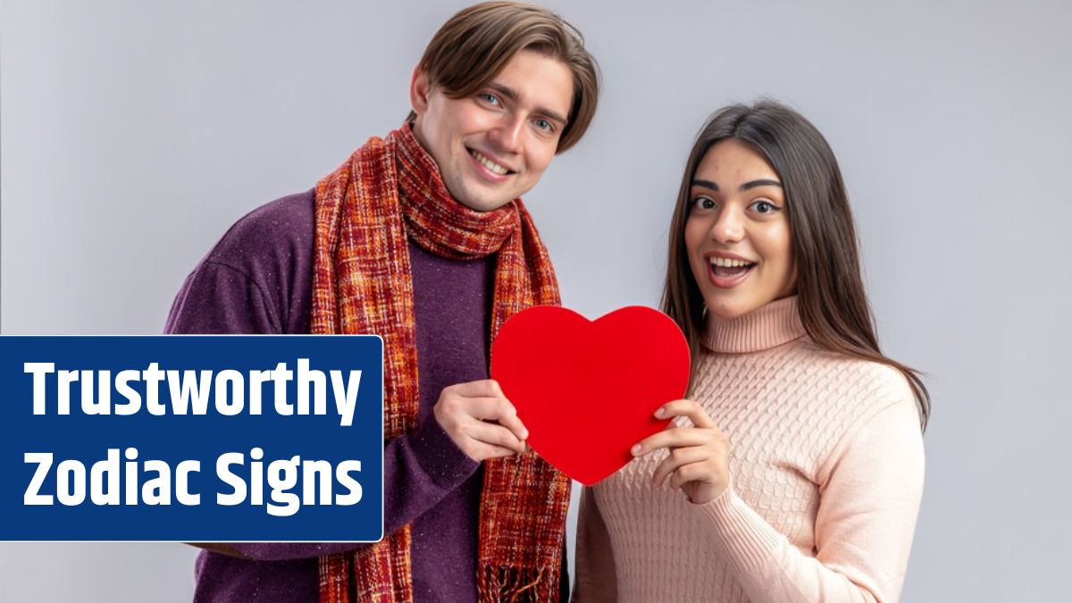 Smiling looking camera young couple on valentines day holding heart shaped box isolated on white background.