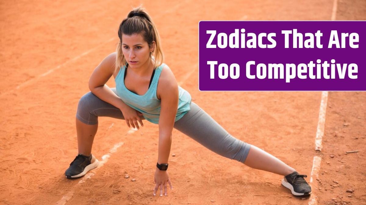 Sporty woman stretching on stadium track.