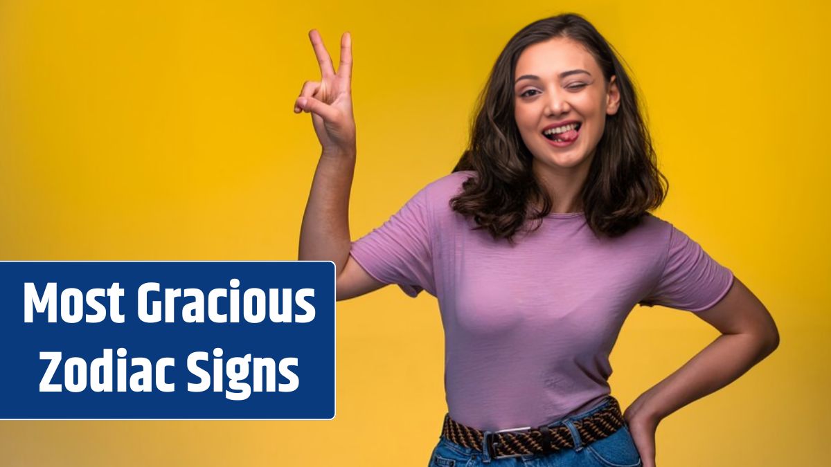 Young girl making friendship sign in hand and tongue out.